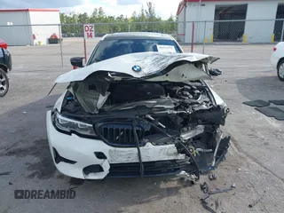 2019 BMW 3 Series 330i z VIN 3MW5R1J57K8A03673, wystawiony jako IAAI lot #41672322 z przebiegiem 72 083 mil mil oraz . Historia ofert i sprzedaży dostępna na DreamBid. Obrazek 12.