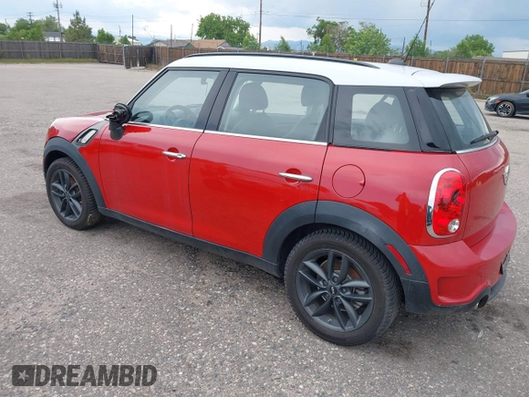 2013 MINI Countryman S with VIN WMWZC3C57DWP21892, listed as a IAAI auction lot 42402600 with 59,700 mi miles and . Bid and sale history available at DreamBid. Image 3.
