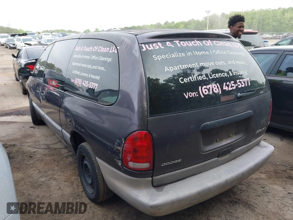 1996 Dodge Caravan Sport with VIN 2B4GP4439TR803645, listed as a IAAI auction lot 42122379 with 185,159 mi miles and . Bid and sale history available at carsss.com. Image 3.