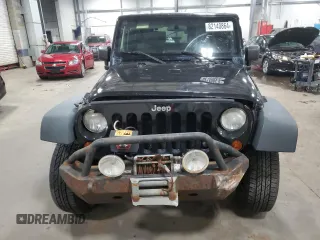 2009 Jeep Wrangler Rubicon with VIN 1J4GA64159L770895, listed as a Copart auction lot 82140864 with 209,464 mi miles and Salvage Title. Bid and sale history available at DreamBid. Image 5.