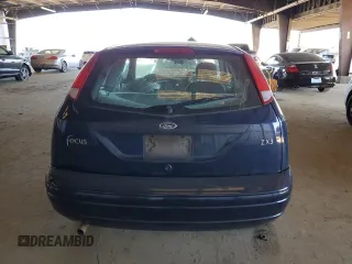 2004 Ford Focus ZX3 with VIN 3FAFP31Z44R127138, listed as a Copart auction lot 48397275 with 129,873 mi miles and Salvage title. Bid and sale history available at DreamBid. Image 6.