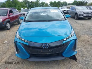 2017 Toyota Prius Plus z VIN JTDKARFP4H3067953, wystawiony jako IAAI lot #42211132 z przebiegiem 90 760 mil mil oraz . Historia ofert i sprzedaży dostępna na DreamBid. Obrazek 12.