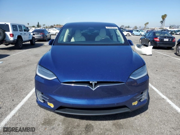 2018 Tesla Model X 75D with VIN 5YJXCBE22JF111938, listed as a Copart auction lot 47000303 with 63,430 mi miles. Bid and sale history available at carsss.com. Image 5.