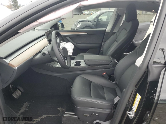 2025 Tesla Model Y Long Range with VIN 7SAYGDEE6SF308226, listed as a Copart auction lot 48006865 with 2,291 mi miles and Salvage Title. Bid and sale history available at carsss.com. Image 7.