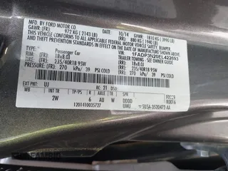 2014 Ford Focus Titanium with VIN 1FADP3N20EL422693, listed as a IAAI auction lot 42060024 with 97,371 mi miles and . Bid and sale history available at DreamBid. Image 9.