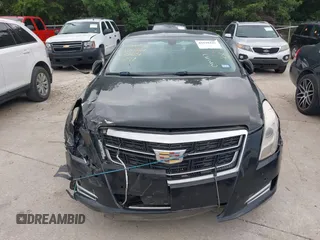 2017 Cadillac XTS Luxury z VIN 2G61M5S32H9158776, wystawiony jako IAAI lot #42528442 z przebiegiem 90 680 mil mil oraz . Historia ofert i sprzedaży dostępna na DreamBid. Obrazek 6.