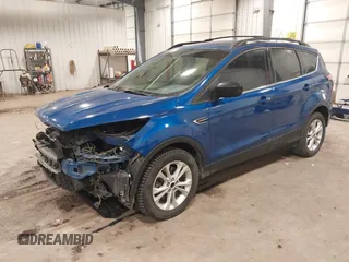 2017 Ford Escape SE z VIN 1FMCU0G90HUA94581, wystawiony jako IAAI lot #41396965 z przebiegiem 104 978 mil mil oraz . Historia ofert i sprzedaży dostępna na DreamBid. Obrazek 18.