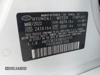 2022 Genesis G70 2.0T z VIN KMTG34TA1NU102975, wystawiony jako Copart lot #47460345 z przebiegiem 30 029 mil mil oraz Szkoda całkowita • Salvage title. Historia ofert i sprzedaży dostępna na DreamBid. Obrazek 13.