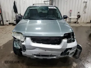 2005 Ford Escape Hybrid with VIN 1FMCU95H55KD77032, listed as a Copart auction lot 41877345 with 241,279 mi miles and Salvage title. Bid and sale history available at DreamBid. Image 5.