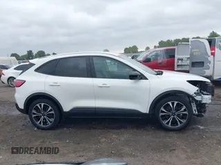 2021 Ford Escape SE z VIN 1FMCU0G6XMUB32625, wystawiony jako IAAI lot #42279918 z przebiegiem 93 646 mil mil oraz . Historia ofert i sprzedaży dostępna na DreamBid. Obrazek 14.