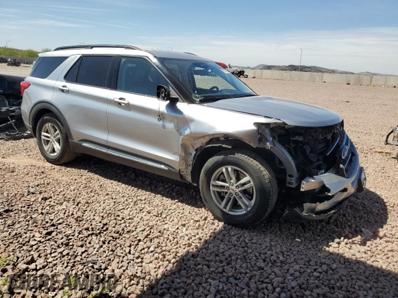 2021 Ford Explorer XLT with VIN 1FMSK7DHXMGB33126, listed as a Copart auction lot 50570655 with 61,894 mi miles and Salvage Title. Bid and sale history available at carsss.com. Image 4.