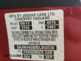 2013 Jaguar XK with VIN SAJWA4GB0DLB50530, listed as a Copart auction lot 82715724 with 24,634 mi miles and Salvage Title. Bid and sale history available at carsss.com. Image 12.