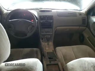 2001 Nissan Maxima GXE with VIN JN1CA31D41T809212, listed as a Copart auction lot 57845405 with 244,502 mi miles and Salvage title. Bid and sale history available at DreamBid. Image 8.