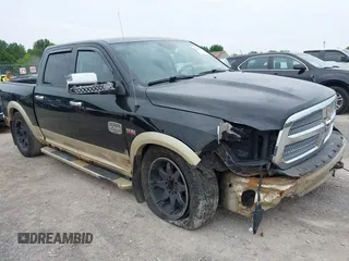 2014 Ram 1500 Longhorn Limited with VIN 1C6RR7PT4ES260345, listed as a IAAI auction lot 42488642 with 163,915 mi miles and . Bid and sale history available at DreamBid. Image 1.