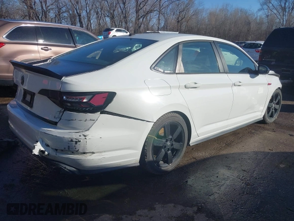 2019 Volkswagen Jetta GLI S z VIN 3VW6T7BU7KM236894, wystawiony jako IAAI lot #41499098 z przebiegiem 107 795 mil mil oraz . Historia ofert i sprzedaży dostępna na DreamBid. Obrazek 4.