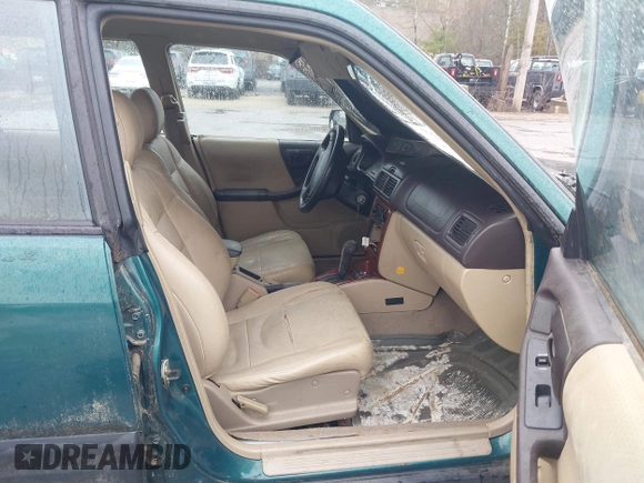 1998 Subaru Forester L with VIN JF1SF6352WH783758, listed as a IAAI auction lot 41971037 with 1 mi miles. Bid and sale history available at carsss.com. Image 5.