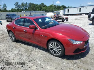 2014 Maserati Ghibli z VIN ZAM57XSA7E1126742, wystawiony jako Copart lot #57495135 z przebiegiem 50 077 mil mil oraz Szkoda całkowita • Salvage title. Historia ofert i sprzedaży dostępna na DreamBid. Obrazek 4.