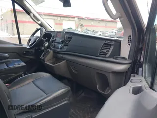2020 Ford Transit Cargo with VIN 1FTBR3XG9LKB75293, listed as a IAAI auction lot 41657375 with 104,280 mi miles and . Bid and sale history available at DreamBid. Image 5.