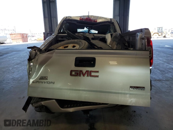 2015 GMC Canyon 4WD SLE with VIN 1GTG6BE36F1263317, listed as a Copart auction lot 53967805 with 129,590 mi miles and Salvage title. Bid and sale history available at DreamBid. Image 6.