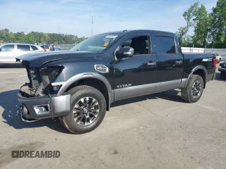 2017 Nissan Titan Platinum Reserve z VIN 1N6AA1E53HN569660, wystawiony jako Copart lot #54409625 z przebiegiem 98 858 mil mil oraz Szkoda całkowita • Salvage title. Historia ofert i sprzedaży dostępna na DreamBid. Obrazek 1.