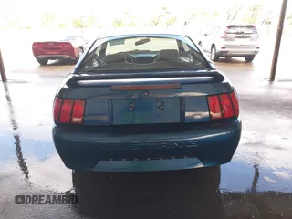 1999 Ford Mustang with VIN 1FAFP4040XF124637, listed as a IAAI auction lot 41793662 with 54,591 mi miles and . Bid and sale history available at DreamBid. Image 16.