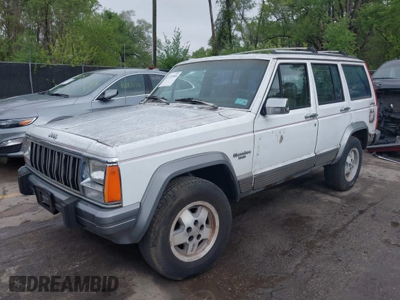 1991 Jeep Cherokee with VIN 1J4FJ58S3ML563620, listed as a IAAI auction lot 42131093 with 198,942 mi miles and . Bid and sale history available at DreamBid. Image 2.