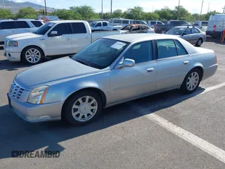 2008 Cadillac DTS 1SD z VIN 1G6KD57Y78U180638, wystawiony jako IAAI lot #42360062 z przebiegiem 90 012 mil mil oraz . Historia ofert i sprzedaży dostępna na DreamBid. Obrazek 2.