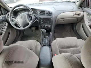 2003 Oldsmobile Alero GL1 z VIN 1G3NL52E83C168023, wystawiony jako Copart lot #76242984 z przebiegiem 154 718 mil mil oraz Szkoda całkowita • Salvage title. Historia ofert i sprzedaży dostępna na DreamBid. Obrazek 8.