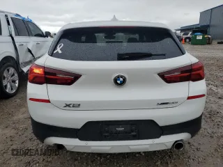 2022 BMW X2 xDrive28i z VIN WBXYJ1C00N5U17584, wystawiony jako Copart lot #55994955 z przebiegiem 21 973 mil mil oraz Czysty tytuł • Clean title. Historia ofert i sprzedaży dostępna na DreamBid. Obrazek 6.