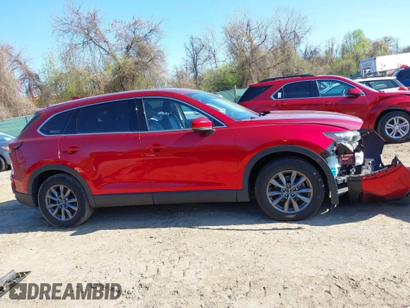 2020 Mazda CX-9 Touring z VIN JM3TCBCY6L0401324, wystawiony jako IAAI lot #41973626 z przebiegiem 53 891 mil mil oraz . Historia ofert i sprzedaży dostępna na DreamBid. Obrazek 14.