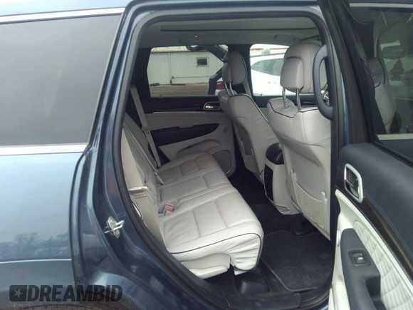 2019 Jeep Grand Cherokee Summit with VIN 1C4RJFJG9KC845787, listed as a IAAI auction lot 41711801 with 83,501 mi miles. Bid and sale history available at carsss.com. Image 8.