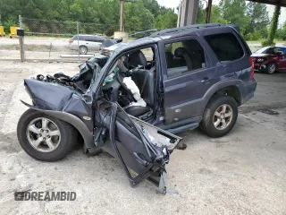 2005 Mazda Tribute S with VIN 4F2CZ06155KM32663, listed as a Copart auction lot 58622554 with 225,000 mi miles and Salvage Title. Bid and sale history available at carsss.com. Image 1.