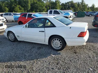 1997 Mercedes-Benz SL 500 with VIN WDBFA67FXVF149930, listed as a Copart auction lot 64749525 with 88,523 mi miles and Salvage title. Bid and sale history available at DreamBid. Image 2.