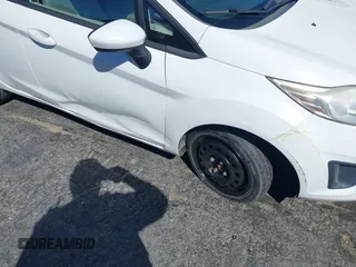 2012 Ford Fiesta SE with VIN 3FADP4BJ7CM102932, listed as a IAAI auction lot 41760394 with 70,394 mi miles and . Bid and sale history available at carsss.com. Image 6.