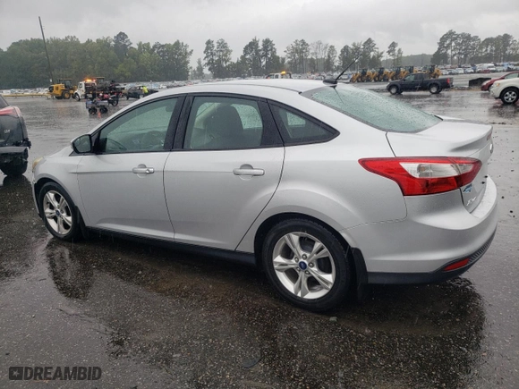 2014 Ford Focus SE with VIN 1FADP3F22EL103956, listed as a Copart auction lot 71005344 with 102,509 mi miles and Salvage Title. Bid and sale history available at carsss.com. Image 2.