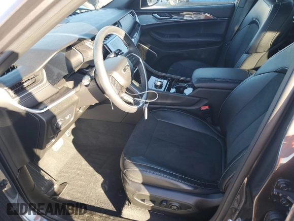 2022 Jeep Grand Cherokee Laredo with VIN 1C4RJHAGXN8598721, listed as a Copart auction lot 83541784 with 5,802 mi miles and Salvage title. Bid and sale history available at DreamBid. Image 7.