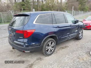 2016 Honda Pilot EX-L with VIN 5FNYF6H55GB050991, listed as a IAAI auction lot 41943049 with 158,255 mi miles. Bid and sale history available at carsss.com. Image 4.