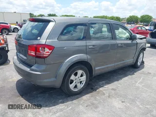2013 Dodge Journey SE with VIN 3C4PDCAB3DT626929, listed as a IAAI auction lot 42318702 with Not provided miles and . Bid and sale history available at DreamBid. Image 4.