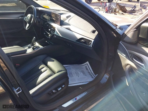 2018 BMW 5 Series M550i xDrive with VIN WBAJB9C55JB287431, listed as a IAAI auction lot 41433436 with 57,790 mi miles. Bid and sale history available at carsss.com. Image 5.