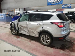 2018 Ford Escape SE with VIN 1FMCU9GD7JUA25403, listed as a Copart auction lot 87158814 with 121,281 mi miles and Salvage Title. Bid and sale history available at carsss.com. Image 2.