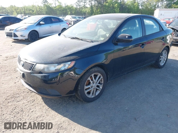 2011 Kia Forte EX with VIN KNAFU4A27B5332784, listed as a IAAI auction lot 42152645 with 237,077 mi miles. Bid and sale history available at carsss.com. Image 2.