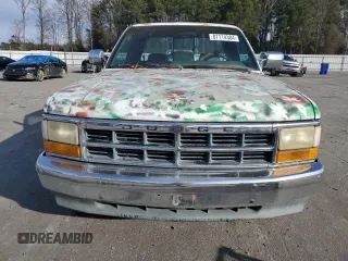 1995 Dodge Dakota z VIN 1B7GL23X7SS250840, wystawiony jako Copart lot #87114384 z przebiegiem 123 860 mil mil oraz Czysty tytuł • Clean title. Historia ofert i sprzedaży dostępna na DreamBid. Obrazek 5.