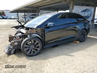 2022 Tesla Model X z VIN 7SAXCBE59NF330091, wystawiony jako Copart lot #55459475 z przebiegiem 49 780 mil mil oraz Szkoda całkowita • Salvage title. Historia ofert i sprzedaży dostępna na DreamBid. Obrazek 1.