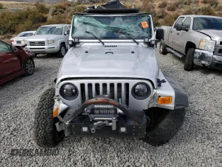 2003 Jeep Wrangler Sport with VIN 1J4FA49SX3P369375, listed as a Copart auction lot 71309184 with 0 mi miles and Salvage Title. Bid and sale history available at carsss.com. Image 5.