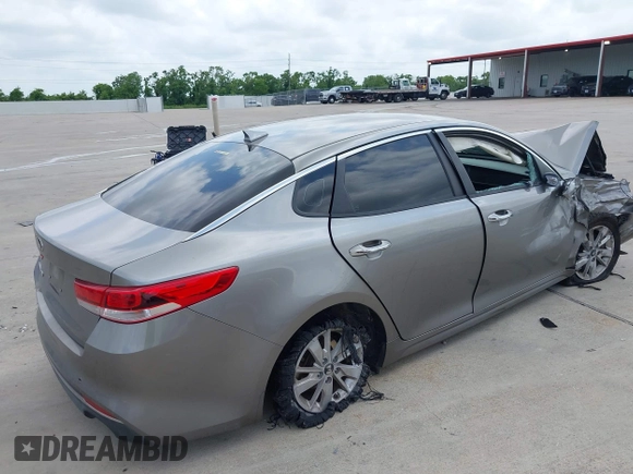 2018 Kia Optima LX with VIN 5XXGT4L38JG237631, listed as a IAAI auction lot 42286779 with 156,471 mi miles and . Bid and sale history available at DreamBid. Image 4.