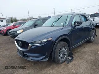 2020 Mazda CX-5 Touring with VIN JM3KFBCM9L0799502, listed as a IAAI auction lot 42007207 with 43,364 mi miles. Bid and sale history available at carsss.com. Image 16.