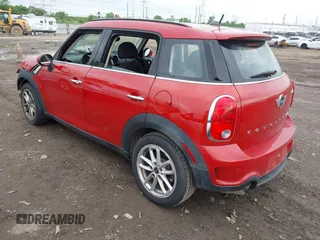2015 MINI Countryman S with VIN WMWZC3C56FWP53249, listed as a IAAI auction lot 42256130 with 104,415 mi miles and . Bid and sale history available at DreamBid. Image 3.