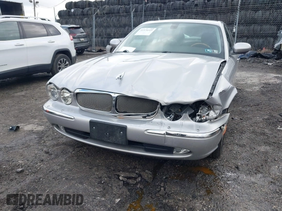 2006 Jaguar XJ with VIN SAJWA71B96SH04571, listed as a IAAI auction lot 41574323 with 1 mi miles. Bid and sale history available at carsss.com. Image 6.