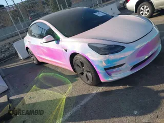 2021 Tesla Model 3 Long Range with VIN 5YJ3E1EB6MF053940, listed as a IAAI auction lot 41344978 with 38,544 mi miles and . Bid and sale history available at DreamBid. Image 1.
