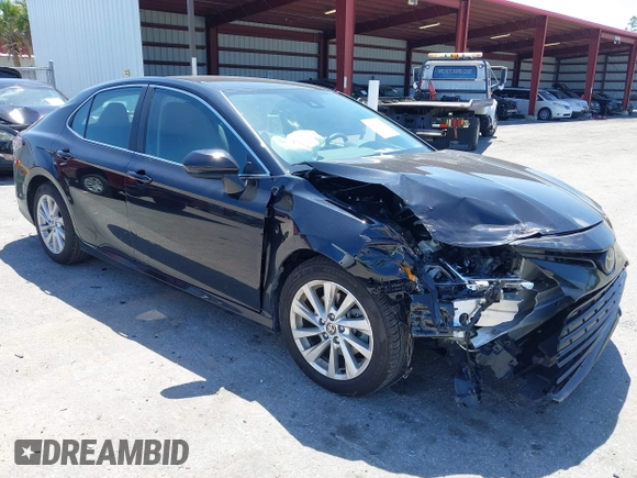 2023 Toyota Camry LE z VIN 4T1C11AK2PU120803, wystawiony jako IAAI lot #42060384 z przebiegiem 38 897 mil mil oraz . Historia ofert i sprzedaży dostępna na DreamBid. Obrazek 1.